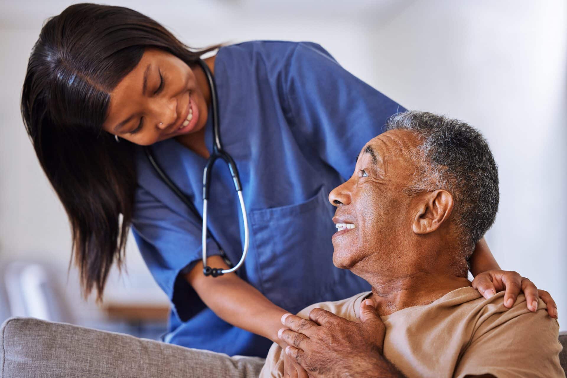 Senior man, volunteer nurse or support caregiver help with elderly in medical nursing home